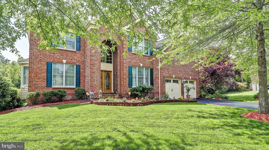 PRICED WELL BELOW MARKET VALUE!!!  Gorgeous and Beautiful 4 bedroom, 3.5 bath home, loaded with custom upgrades throughout in highly sought after equestrian community Marlboro Ridge!  This home includes a 2 story foyer, new hardwood floors, stunning 2 story family room with custom drapes, gorgeous gourmet kitchen offering Energy Star appliances, large center island with cooktop, granite counters, decorative tiled backsplash with plenty of custom cabinets, gas fireplace and many other amenities.  The Morning room has a wall of Pella windows that leads to a beautiful deck that overlooks trees and nature trails.  Beautifully landscaped, with enclosed sunroom and 2 exterior patios.  Finish last minute work in the main level library boasting french doors.  The upper level master suite has all new wood floors, custom his and her walk in closets, en suite bath has new granite dual countertops, and upper level has 3 additional spacious bedrooms.  The lower level recreation room also has a theater room, plenty of room to entertain family and friends on the patio or enclosed sunroom.Close to Joint Base Andrews AFB, Ft. Meade, NSA, Joint Base Anacostia-Bolling, Pentagon, 5 miles to metroThe beautiful Marlboro Ridge community is loaded with amenities, clubhouse, pools, fitness room, tennis, playgrounds, state of the art equestrian center, and miles of nature trails.