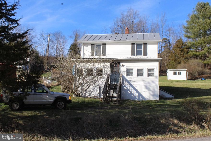 Located just outside of town, close to the Upper South Branch of the Potomac, this 3 bedroom, 1 bath home is perfect for a weekend getaway or your first starter home.  Home is sold "AS-IS", but with a little imagination could be a beautiful place to call home.