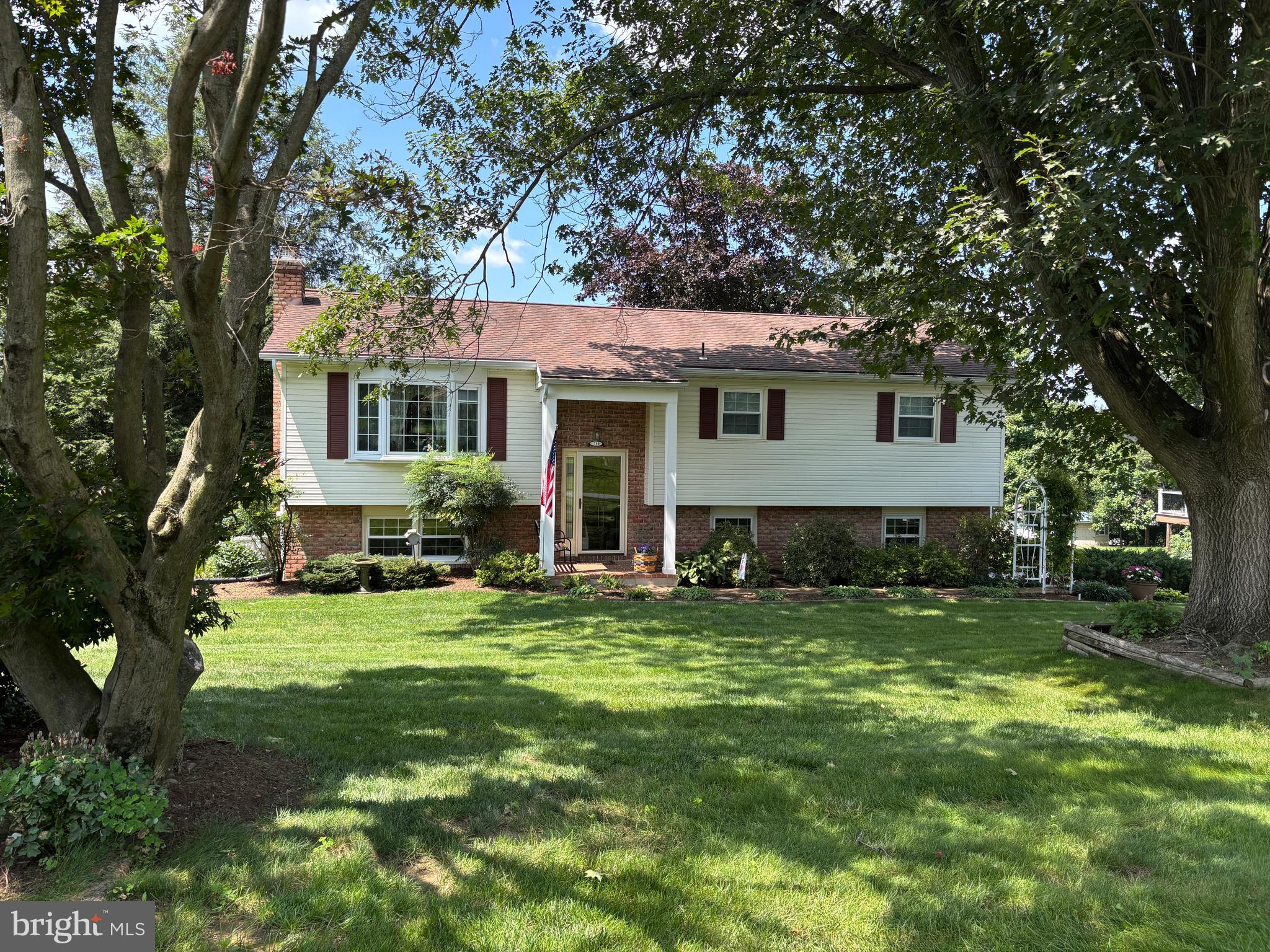 Very nice Bi-Level on a flat 0.47 acre lot in a quiet country development - New windows, roof, siding 2009 - Spacious rooms, ample kitchen cabinets w/recent SS appliances - Dining Area w/breakfast bar peninsula - super enclosed porch w/a 10x14 composite wood deck w/roof - Dandy LL, Fireplace w/gas log insert - Very nice and versatile Lower Level Den/Office/Computer room off the FR w/built-in cabinets & shelves - Lower Level laundry, full bath w/shower stall - 3 nice sized main level BRs, each w/ceiling fans, plus a door from BR1 to the full bath - Oversized 2-car garage w/openers - Nice brick walks, mature landscaping - Minutes to PA Turnpike, Rt. 322, 501, 222. Owner may prefer a "Rent Back" to move out on Oct. 10th to a retirement home.