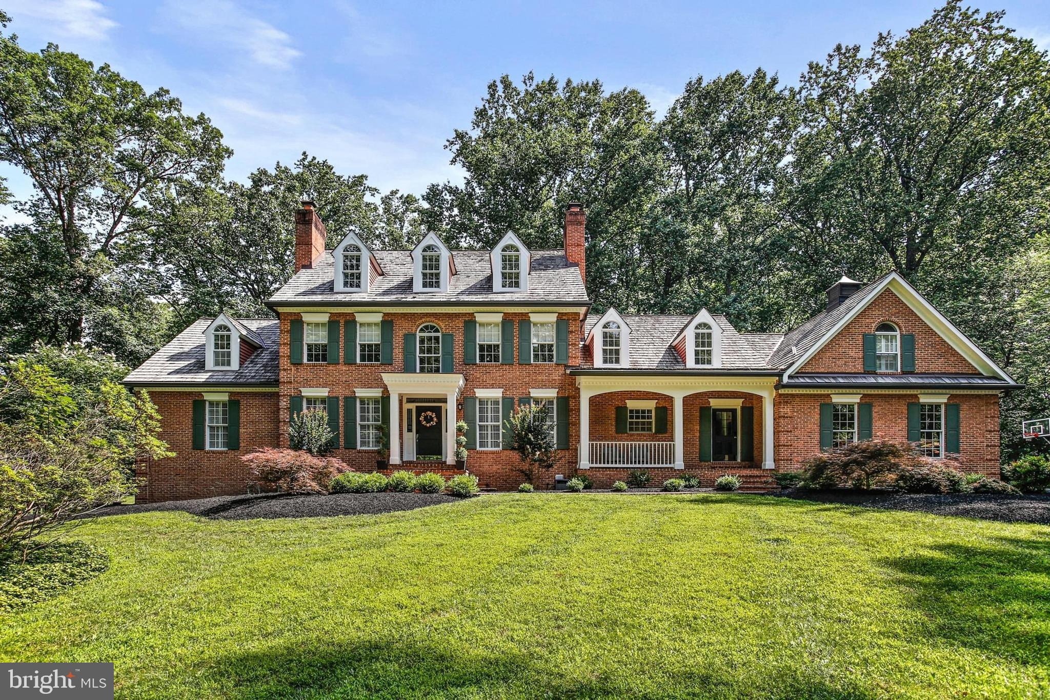 Welcome to this stunning 6-bedroom, 4.5-bath custom home nestled on a private 3.3-acre lot in Ellicott City. Thoughtfully renovated and impeccably maintained, this residence seamlessly blends modern luxury with timeless shabby chic charm. The heart of the home is the show-stopping kitchen that is completely reimagined with custom cabinetry, designer finishes, and top-of-the-line Wolf and Sub-Zero appliances. Ideal for both everyday living and entertaining, this space is as functional as it is beautiful. Spread across four finished levels, the home offers a flexible layout that includes spacious living and dining areas, a charming front porch, and generous bedroom suites. The primary bedroom features two walk-in closets and a private en-suite. While the additional bedrooms provide ample space for family, guests, or home offices. Outdoor living is a dream with a back deck, brick patio, and a private in-ground pool, all surrounded by serene, professionally landscaped grounds. A three-car garage adds convenience and extra storage. This one-of-a-kind property offers peace, privacy, and style all just a short drive from major commuter routes and local amenities. Don't miss your opportunity to own this exceptional home.