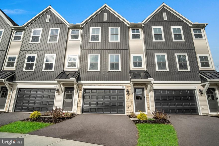 Welcome to 14 Morgan Circle, a stunning turnkey home that showcases exquisite design and quality craftsmanship. The main level boasts a spacious open-concept design, seamlessly integrating the dining area, kitchen, and living room for effortless entertaining and everyday living. Upstairs, you’ll find a generous owner’s suite with full bath, along with two additional bedrooms and a secondary full bath. The lower level offers a large 1.5-car garage complete with an automatic opener, plus ample unfinished storage space to suit all your needs. Don't miss your chance to call 14 Morgan Circle home—schedule a tour today!