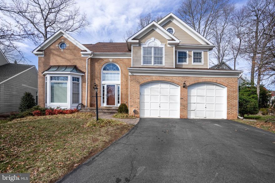 Welcome to 20618 Bridgeport Court, a stunning residence nestled in the heart of Loudoun County, offering an exquisite blend of elegance and comfort. This spacious home boasts 3,552 square feet of thoughtfully designed living space within three fully finished floors, and a fenced-in backyard.  Only minutes away from the Algonkian Park with access to the Potomac! Bring in your kayaks, paddleboats and jetskies for some summer fun! HOA inludes FIVE community pools, basketball, tennis and pickleball courts as well as beatiful trails and parks. 

Upon entering, you are greeted by a grand foyer that leads to an inviting formal dining and living room, perfect for hosting memorable gatherings.  The main level areas boast hardwood floors; the family room area features a cozy fireplace, enhanced by recessed lighting.  The two-level formal living area offers a charming bay window that bathes the room in natural light. The renovated kitchen offers gleaming white quarts counter tops,  a pantry and seamlessly connects to a spacious deck and brick patio, ideal for outdoor entertaining.

This home offers a total of five bedrooms, including a luxurious primary suite on the second level with a walk-in closet and a lavish soaking tub. There are a total of 3.5 bathrooms which are beautifully appointed, ensuring convenience and privacy for everyone.  The main level offers a fifth bedroom, which has been converted into an office with built-in shelves throughout. Also in the main level, you will find a spacious laundry room which includes built-in shelves, a washer and a dryer. 

The fully finished basement provides ample recreational and storage spaces and offers a walk-up staircase that leads to the backyard.  The basement also features a large den and a full bathroom.  Enjoy the array of community amenities such as a pools, tennis, pickleball and basketball courts, a playground, and a club house, all with security included for peace of mind.

This exceptional property combines luxury and functionality, making it the perfect place to call home. Don't miss the opportunity to experience this elegant retreat and the best schools in the nation.