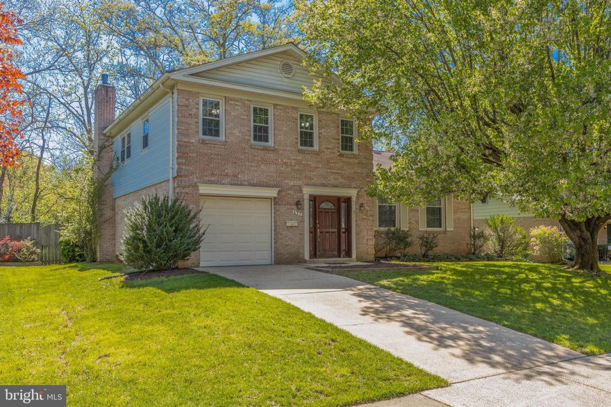 Welcome home to this wonderfully maintained 4 bedroom, 2.5 bathroom brick split-level home in the highly sought-after Heywood Glen community. Hardwood floors and fresh paint throughout this light and airy home. The home enjoys a large living room, a wonderful family room with a gas fireplace, and a formal dining room. The kitchen includes new granite countertops and features SS appliances, a large breakfast area and a gorgeous view of the backyard. The laundry/ mudroom is also conveniently located next to the kitchen as well. Upstairs you will find four bedrooms, including the primary bedroom. The full basement is unfinished and ready for your personal design. The backyard is an entertainer's dream, featuring a large patio which creates your own beautifully landscaped and private oasis backing to an incredibly serene park owned by a nearby church. This home is conveniently located close to major commuter routes, bus stops, and metro lines for easy access to Washington DC and the Pentagon.