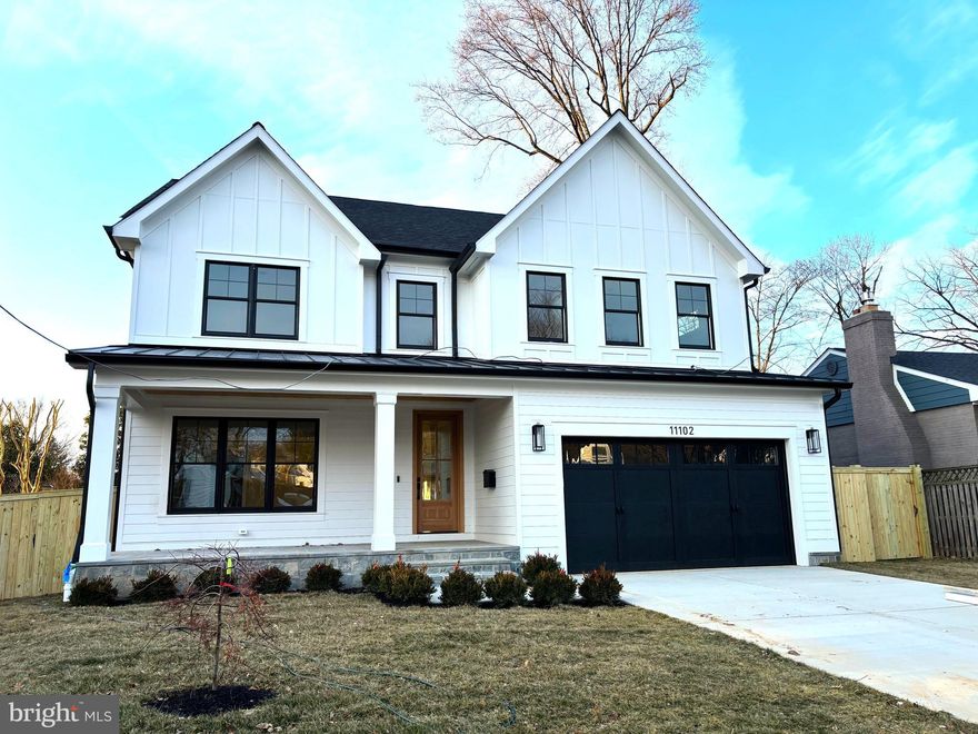 100% Completed! Welcome to 11002 Stillwater Avenue, built by esteemed builder, ERB Properties! This extraordinary home offers an amazing open floor plan with 3 finished levels, 5 bedrooms, 4.5 bathrooms and over 5,400 square feet of living space! Featuring beautiful craftsmanship and finishes with generous-sized rooms, abundant recessed lighting and wide plank hardwood floors, it is ready for you to move right in! The main level includes a living room, formal dining room, gourmet chef’s kitchen with high end appliances, soft close cabinets & drawers, quartz countertops, island with waterfall counter and a walk-in pantry. The main level also features a light and bright family room with a gas fireplace, a large mudroom with cubbies and a bench and a powder room. The spectacular upper level boasts a primary suite with two walk-in closets and a luxurious spa bathroom with a separate oversized frameless glass enclosed shower with dual shower heads, a soaking tub and two sinks. Also on the upper level are 3 additional bedrooms, 2 additional full bathrooms, a lovely, open family/homework-study area and a laundry room with a washer and dryer. On the spacious lower level you will find a recreation room with a wet bar and beverage refrigerator, a 5th bedroom, a 4th full bathroom, an exercise room with rubber mat and mirror, additional storage space and a separate walk up back entrance. Additional features include an attached two car garage and a covered Trex deck! Located in the lovely Garrett Park Estates subdivision, this home is part of the Walter Johnson High School cluster.