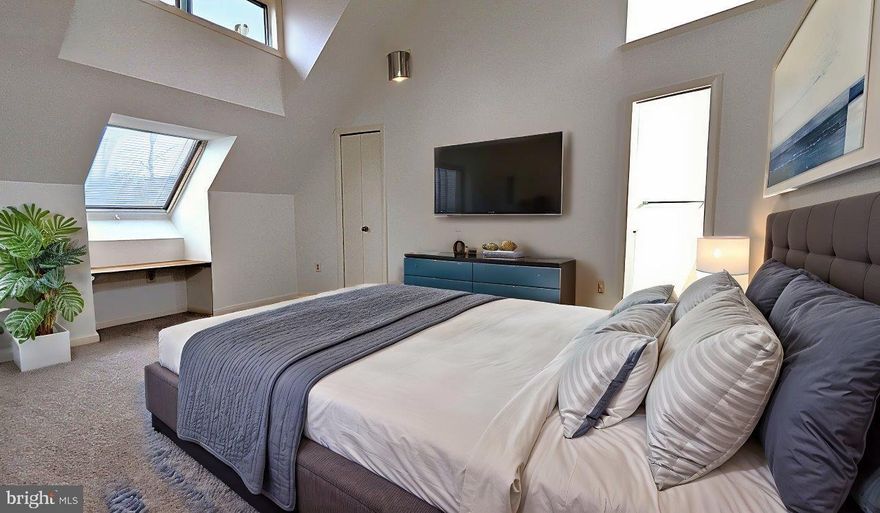 As you step through the front door, you're greeted by shining original hardwood floors in the entryway leading into an inviting 2 story family room bathed in natural light streaming through double sliding glass doors that frame the backyard wooded landscape. The open floor plan seamlessly connects the bright sunroom to a cozy dining area, where gourmet meals and heartfelt conversations are destined to unfold.
The kitchen, though modest in size, is the heart of the home. It's a space where culinary magic happens, where the aroma of freshly baked cookies fills the air and the sizzle of Sunday morning bacon dances in the background. 
Two main level bedrooms, each have its own unique character, offer a sanctuary for rest and rejuvenation. A full bathroom between these two bedrooms is perfectly located for easy access.  The primary bedroom suite extends the entire top level boasting roofline vaulted ceilings and skylights for extra lighting.  It is a haven of tranquility. 
The primary bath invites you to unwind in a large soaking tub with double sinks that brings a sense of relaxation.
But the story doesn't end here. The house boasts an partially finished Walk-Out basement (studs are in place for Two extra Bedrooms + Recreation Room & Storage Room, all wiring for outlets, ventilation, lighting, and a rough-in for a Full Bathroom.  It only needs drywall installation for wall & ceiling + flooring) a blank canvas waiting for dreams to be realized. Imagine a cozy entertainment space, a home gym, or even an artist's studio. The possibilities are as endless as your imagination.
The 1/4 acre lot surrounding the house is a canvas of nature's beauty. A sprawling backyard offers the perfect setting for summer barbecues, gardening ventures, and starry night stargazing. Mature trees provide shade on warm days.
This house is more than just a dwelling; it's a place where life's most precious moments unfold. It's a home where stories are written, memories are made, and love resides. It's a place where the past and future converge, creating a timeless safe space for those lucky enough to call it their own.