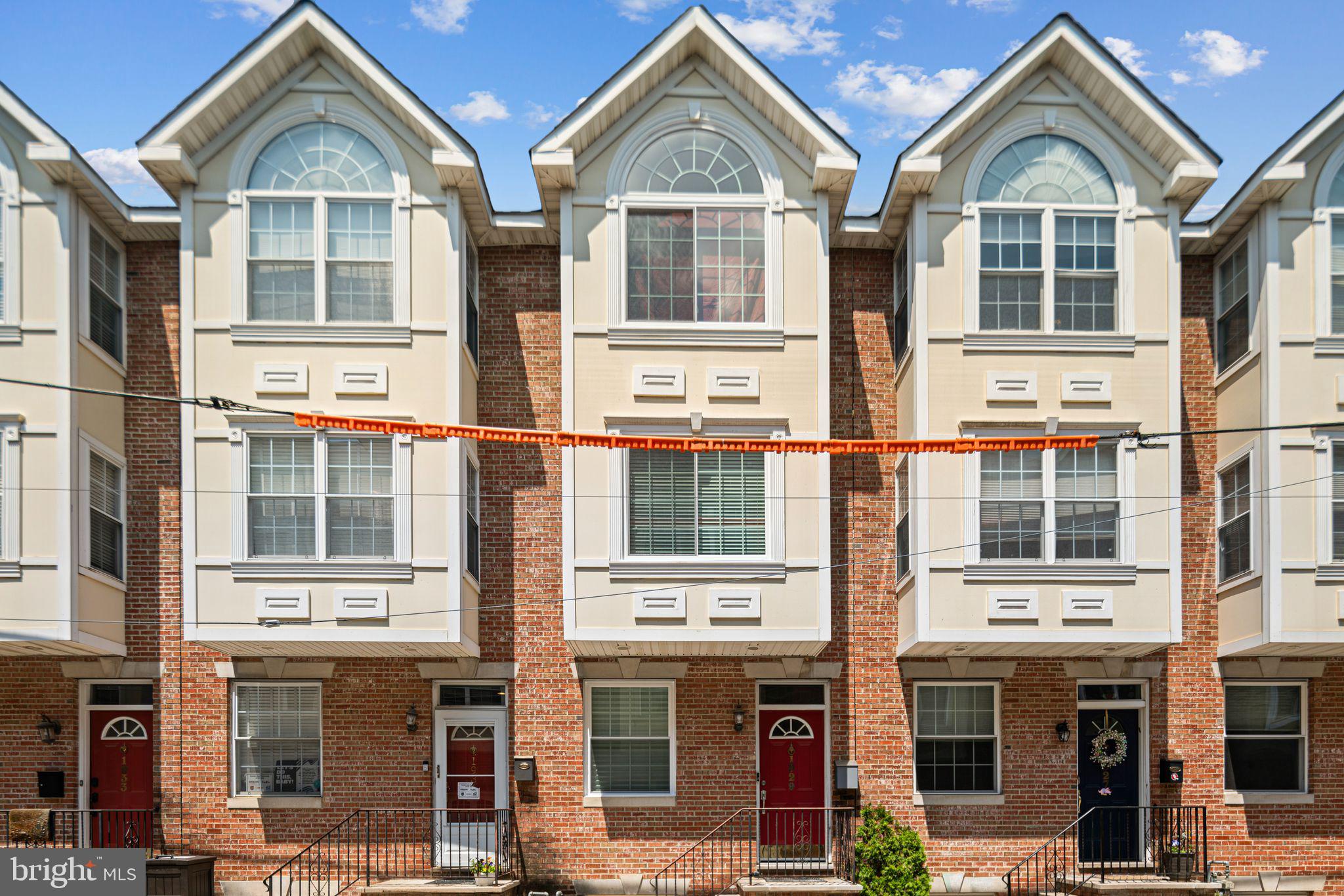 Buy this $624,900 home for the same payment as a $504,000 home! MAXIMIZE YOUR BUYING POWER with exclusive seller financing! Well qualified buyers can lock in rates from the mid-4’s to mid-5’s, depending on down payment, and save up to $13K in closing costs. Minimum 20% down payment. All buyers must be pre-approved through Preferred Lender to be considered. No formal underwriting, no discount points, close in as little as 14 days. Traditional financing is also accepted! Welcome to this beautiful, must-see home in one of Philadelphia’s most desirable neighborhoods—Graduate Hospital! This well maintained, owner-occupied home offers 4 bedrooms and 3.5 bathrooms, while sitting on a generous 15ft wide lot. Featuring newer windows throughout, a roof deck with picturesque views of the skyline, recessed lighting, hardwood floors throughout, a half bath on the first floor, a backyard space, a finished basement, newer stainless steel appliances, and much more! Step into the main level and be greeted by warm hardwood floors and a bright, open-concept layout perfect for entertaining. The spacious living room features crown and chair rail molding, 9ft high ceilings, and a large picture window that floods the space with natural light. Proceed through the charming archway into the tiled floor kitchen featuring quartz countertops, cherry wood cabinets, an island with bar seating, and stainless steel appliances including a gas stove. Just off the kitchen is a versatile coat closet that could easily be converted into a pantry, and a powder room for ultimate convenience. Through sliding glass doors, you’ll find a private, fenced patio—perfect for entertaining, grilling, or enjoying quiet evenings outdoors. Upstairs, the second floor boasts two generously sized bedrooms, each with walk-in closets, and a full hall bathroom. On the third floor you'll find a huge master suite, complete with vaulted ceilings, elegant arched windows, unique angled hardwood flooring, a gas fireplace, a generously sized walk-in closet, and a luxurious en-suite bath featuring a double vanity, glass-enclosed shower, and a whirlpool tub. Walk up to the pilot house to access your private rooftop deck—offering stunning, unobstructed views of the Philly skyline. Built with low-maintenance composite decking, it’s the perfect spot for morning coffee or evening gatherings. Head down to the fully finished basement to find the 4th bedroom or flex room with a gas fireplace, a full bathroom, and a laundry room complete with a utility sink and room for storage. Located within the highly regarded Marian Anderson school catchment, this home offers unbeatable walkability to South Street's vibrant shops and restaurants, the Washington Avenue corridor, and conveniences like Sprouts, Target, ALDI, Giant, PetSmart, Wine & Spirits, Starbucks, Chick's, Sidecar Grille and more. You'll also enjoy easy access to CHOP, UPenn, the South Street Bridge, and I-76. Don’t miss this rare opportunity to own a thoughtfully updated home in the heart of Graduate Hospital—schedule your tour today!