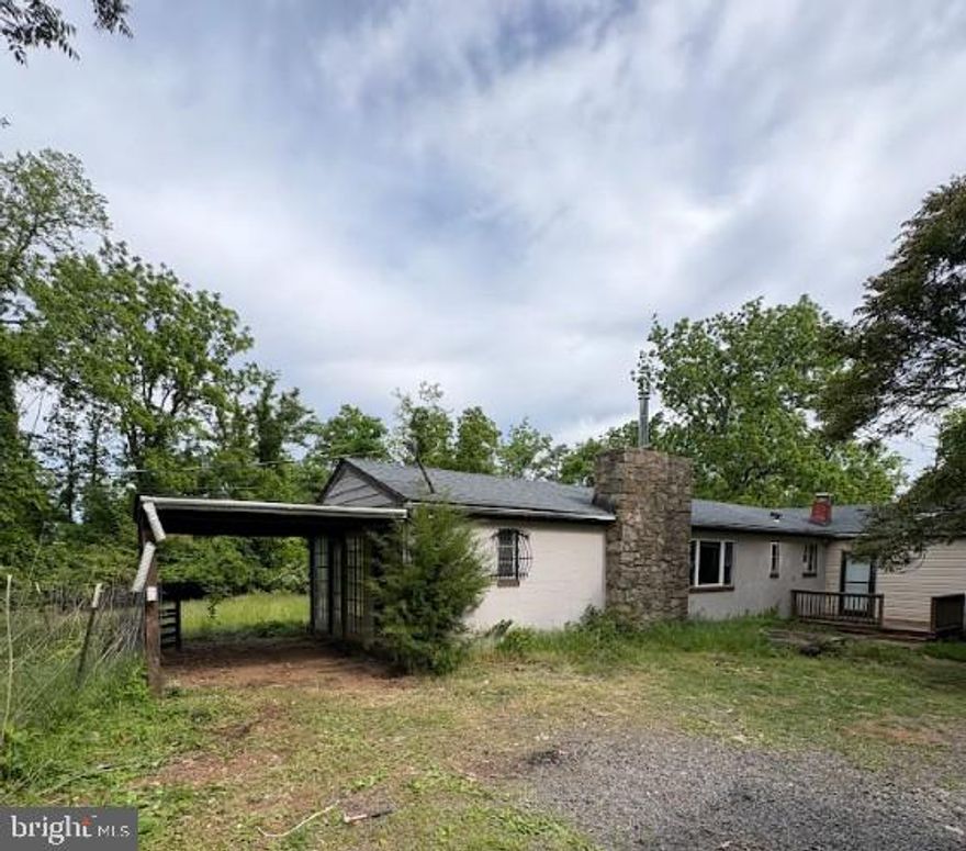 **Landscaping will be done the week of 5/25th**  Nestled on nearly 6 private acres in the Blue Ridge Mountains, this investor special offers endless potential in a peaceful, semi-rural setting just approximately 15 minutes from Route 66. The property features a desirable mix of wooded privacy and usable flat land — a rare find for mountain properties in the area.



Surrounded by some of Virginia’s most scenic outdoor destinations, the property is located only 5 miles from the Shenandoah River at Karo Landing and offers immediate access to iconic hiking trails including the Appalachian Trail and nearby waterfalls.



The existing home features just under 1,700 square feet with 2 bedrooms and 1 bathroom, including an oversized primary bedroom with a fireplace and direct access to the backyard. Additional features include a sunroom, carport, and tranquil wooded surroundings that create the feel of a private retreat.



Conveniently located less than 15 minutes from both Capstone Vineyards and Chester Gap Cellars, and approximately 10 minutes to Accord Winery.



Property is being sold strictly as-is. Excellent opportunity for investors, renovators, short-term rental potential, or buyers seeking a private mountain getaway.