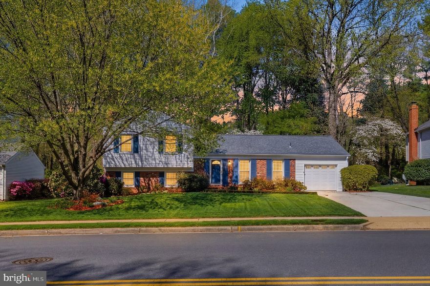 A quiet, tree-lined street backing to Lake Braddock Park, with the lake just a short walk away. Sunlight moves through the home as you step inside, and the pace shifts almost immediately.  <br><br>

This beautifully renovated three-level split offers something increasingly rare: a functional, easy layout paired with an outdoor setting that feels like a true escape.  <br><br>

The main level is where everything connects. Hardwood floors, natural light, and a clean flow between living, dining, and kitchen mean you’re not navigating around awkward transitions. Nothing to work around. Nothing to reconfigure.  <br><br>

The kitchen renovation is complete and intentional, with custom cabinetry, quartz counters, and a layout that keeps you part of the room while you cook, whether it’s a quiet morning or a full house.  <br><br>

Sliding doors open from the dining area onto the composite deck, and this is where the home shifts.  Step outside and the backyard becomes the reason you stay.  <br><br>

The deck and stamped concrete patio create two distinct spaces to gather, relax, or simply sit and exhale. The yard is fully fenced, professionally landscaped, and supported by irrigation, so it looks the way you want it to without becoming another responsibility. As the landscape lighting comes on in the evening, the entire space softens and becomes somewhere you’ll actually want to spend time, not just maintain.  <br><br>

Upstairs, three bedrooms are grouped together, which quietly simplifies everyday living. The primary suite offers a calm, private place to reset, with an updated shower and storage that keeps everything organized without effort. The secondary bedrooms are bright, well-sized, flexible, and share a full bath that's equally well-finished.  <br><br>

The lower level gives you space to separate when you need it. Large windows bring in daylight, and the gas fireplace adds warmth without making the room feel heavy. It works as a second living area, a media room, or a place to step away and recharge. The fourth bedroom and half bath create options for guests, work, or longer-term flexibility — and tucked neatly behind the scenes, the mechanical core is already sorted: upgraded electrical panel, whole-house water filtration, washer and dryer, and newer HVAC and water heater.  <br><br>

The practical pieces are already handled, in a way most homes haven't caught up to yet. Major updates include the roof (2019) and most windows (2020), along with thoughtful improvements throughout that support both comfort and long-term ease of ownership. The expanded driveway gives you two side-by-side spaces, so no one is playing musical cars. The garage includes an EV charger and an attached workshop area. High-speed wiring runs throughout. A full security system is already in place.  <br><br>

Beyond the property itself, Lake Braddock extends the sense of escape. A 27-acre lake, walking paths, pools, courts, and schools within the community give you places to reset and get outside without needing to leave your neighborhood.  <br><br>

This is a home where the work is done, the systems are handled, and your time here can actually feel like time off.