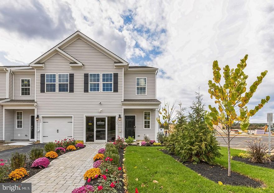 RECEIVE RATES AS LOW AS 5.99% WITH USE OF OUR IN-HOUSE LENDER, DHI MORTGAGE.

The Delmar by D. R. Horton is one of the best priced new construction 2-story townhomes in Upper Macungie located in an inviting community with ample open space! This townhome features 1,500 square feet of open living space, 3 bedrooms, 2.5 bathrooms and a 1-car front-entry garage. This home is an interior unit. The main level eat-in kitchen with quartz countertops, upgraded cabinets, stainless steel appliances (including a refrigerator) and opens to an airy, bright dining and living room. The second level features 3 bedrooms, all with generous closet space, a hall bath, upstairs laundry complete with a washer and dryer and a spacious owner's suite that highlights a walk-in closet and owner's bath with a double vanity and quartz countertops. 

The community also features wonderful amenities including a playground and open space. Our location is truly unmatched with close proximity to major highways and nearby cities such as Allentown, Lehigh, Bethlehem and the overall Lehigh Valley. Enjoy an abundance of shopping, restaurants, fitness and lifestyle activities, theater venues, farmers markets and much more! Local attractions include the beautiful Lehigh Valley Zoo, Crayola factory, Dorney Park and many more!   All your everyday needs can be met by taking a quick drive to nearby Wegmans, Whole Foods, Target, Giant supermarket and more. Parkland Crossing provides convenience at an affordable price! 

**Photos are representative and not the actual home.  Finish colors in this home may be different.**
**Final sales price is $397,990 list price.**
**1146 Martin Road is located at Lot 1302 in Parkland Crossing.**
**August 2024 settlement is preferred.**