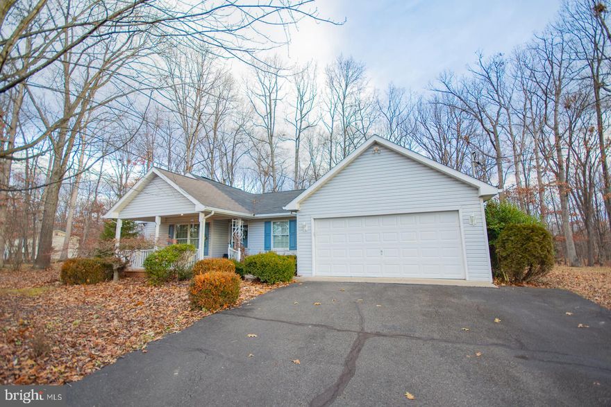 Welcome to this beautiful ranch home in desirable Foxcrest Manor on over an acre of ground. This home offers 3 bedrooms and 2 baths. A large living room with vaulted ceilings and a gas fireplace. Hugh country kitchen/ dining combo with doors that lead to the wonderful sunroom to enjoy nature with your morning coffee. There is also a side deck and a big front porch for relaxing. The 2 car garage, storage shed and mature landscaping complete this home. A Must See!!