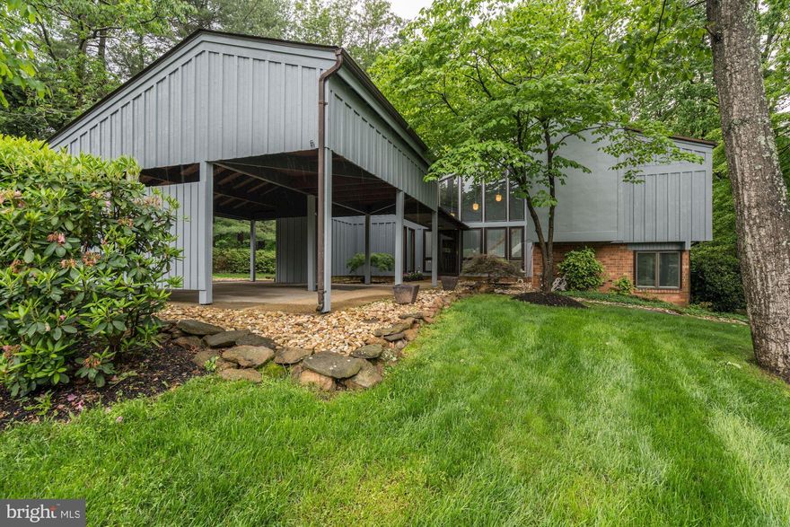 Stunning Contemporary with Extensive Upgrades Offering 4BR /3.5 BA set on Over 1/2 Acre Lot with Private Park-Like Setting in Sought after  Vienna/Wolf Trap Neighborhood.  Beautiful Open Concept Kitchen/Dinning/Great Room Ideal for Entertaining. Soaring Cathedral Ceilings and Endless Windows Fill This Gorgeous  Home w/ Natural Light All Day Long. Gourmet Kitchen Features Newer SS Appliances, High End Custom Italian Cabinets and Artemide Lighting. Freshly Painted Interior and Exterior. New Tigerwood Flooring in the Living Room and Newly Refinished Tigerwood Flooring  in Great Room with Modern Gas Fireplace. Newly Replaced Carpet w/ Tempur-Pedic Padding.  Flowing Split Level Floor Plan w/ Generously Sized Bedrooms. Finished Walkout LL w/ in-law/au-pair Suite. Highest Efficiency Carrier HVAC and Tankless Hot Water Heater. Professional Custom Landscaping. Top Rated Schools. Easy Access to Tyson's Corner, Wolf Trap, Toll Road, and Bike Path to Silver Line Metro and Much More! This is a solid 10!!!!