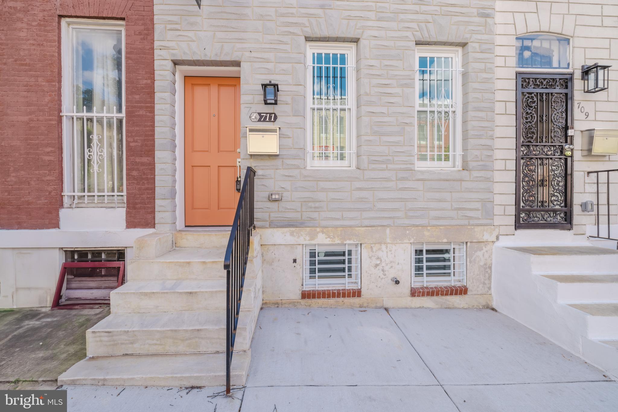 Note: SELLER WILL GIVE $5,000 IN SELLER HELP and free washer and dryer with use of preferred lender and title company. HUGE CHAP tax credit (greatly reduces your taxes for 10 years. In addition, this home is eligible for many grants and tax breaks! Eligible for $10k V2V grant towards down payment (as long as V2V has money in their program) and buy back the block (give up to 20K to eligible buyers). These and other grant programs may be stacked. **Charming & Completely Rebuilt 3-Bedroom Home Baltimore Townhome!**  Newly Rebuilt Home meaning other than the foundation, the marble stoop and some brick, we have newly constructed  everything; New Water lines, New sewer lines, New Framing, New walls, New Floors, New windows, New Roof, New Electric, New Plumbing, New systems and more.  Step into this beautifully rebuilt 3-bedroom, 2.5-bath home featuring an open floor plan and high ceilings throughout. The spacious living room boasts floor-to-ceiling windows, filling the space with natural light. HARDWOOD FLOORING flows seamlessly into the eat-in kitchen, which showcases brand-new granite countertops, stainless steel appliances, and a convenient half bath on the main level.  The fully fenced backyard is perfect for entertaining. Upstairs, upper 1, offers two generously sized bedrooms that share a full bath, along with a conveniently located laundry area. Upper 2 is dedicated to the stunning primary suite, complete with a private full bath and cozy bedroom retreat.  Brand-new carpeting extends throughout the upper levels. The lower level includes extra insulation for added protection and an abundance of storage space.  This stunning home is truly a **must-see**—don’t miss your chance to call it home! LOCATION! LOCATION! LOCATION! Walkability to the inner harbor Johns Hopkins Hospital less than 2 miles, 6 bus stops nearby, metro station 10 minute walk, train station 5 minute walk, light rail 1 mile away, airport 10.6 miles.