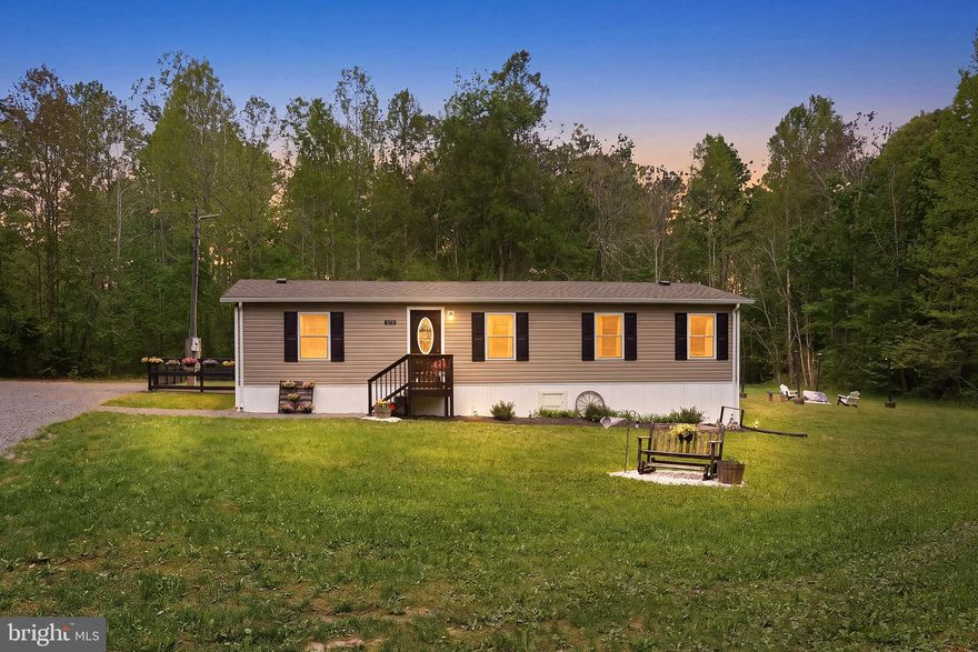 Beautifully renovated in 2024 and move-in ready, this charming home blends modern updates with peaceful country living. Situated on 2.44 private acres and set back from the road, it offers exceptional privacy, quiet surroundings, and the space and freedom ideal for homesteading, gardening, hobbies, or simply enjoying nature. Inside, you’ll find a bright open layout with a fully updated kitchen featuring granite countertops, stainless steel appliances, and new cabinetry. Luxury vinyl plank flooring flows through the main living areas and Master Suite. A handcrafted one-of-a-kind barn door adds warmth, charm, and custom character. Major upgrades include a new roof, new siding, fresh paint, new HVAC system, new water heater, new windows, and renovated kitchen and baths. Outside, enjoy plenty of room to create your dream outdoor space, raise animals, entertain, or relax in the peaceful surroundings. Come tour this rare turnkey property and experience the perfect blend of modern convenience and country charm for yourself.