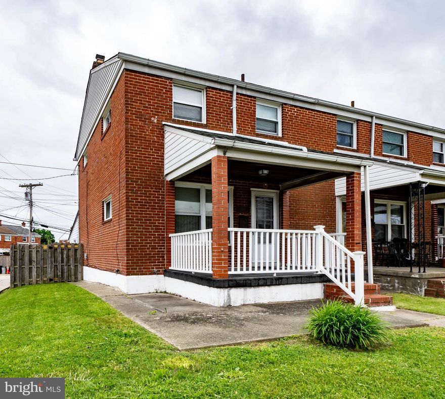3 Bedroom End of Group townhouse, corner lot, fenced rear yard, off street parking in rear, gourmet kitchen with stainless steel appliances and granite counter tops, island in kitchen, fully finished lower level  with updated tile shower stall. Large rear addition could be used as family room. Covered front porch.