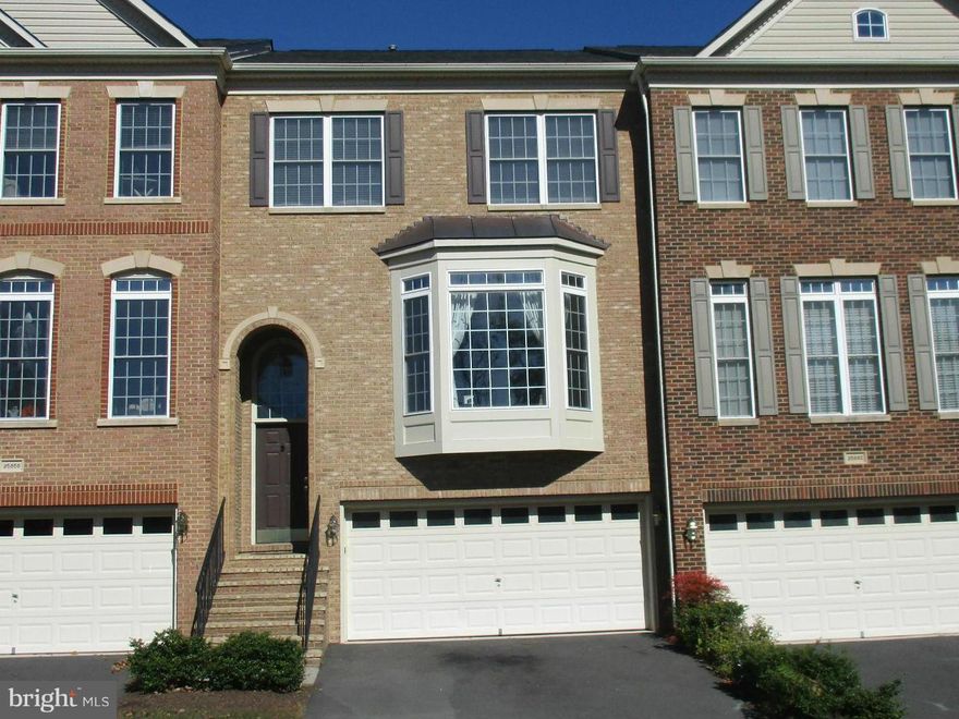 Fabulous 2-Car Garage Townhouse in Pristine Condition; Lite & bright; Spacious; Living rm w/full bay; Dining rm w/Columns; Gourmet Kitchen w/upgraded appliances & cabinets, Granite counters, Breakfast area; Inviting family room w/park like views, Master suite w/super bath & jetted tub + shower; Huge Rec rm w/Gas fireplace & walkout to fenced yard; Move-in ready, Quiet Street; Perfect & a must See!