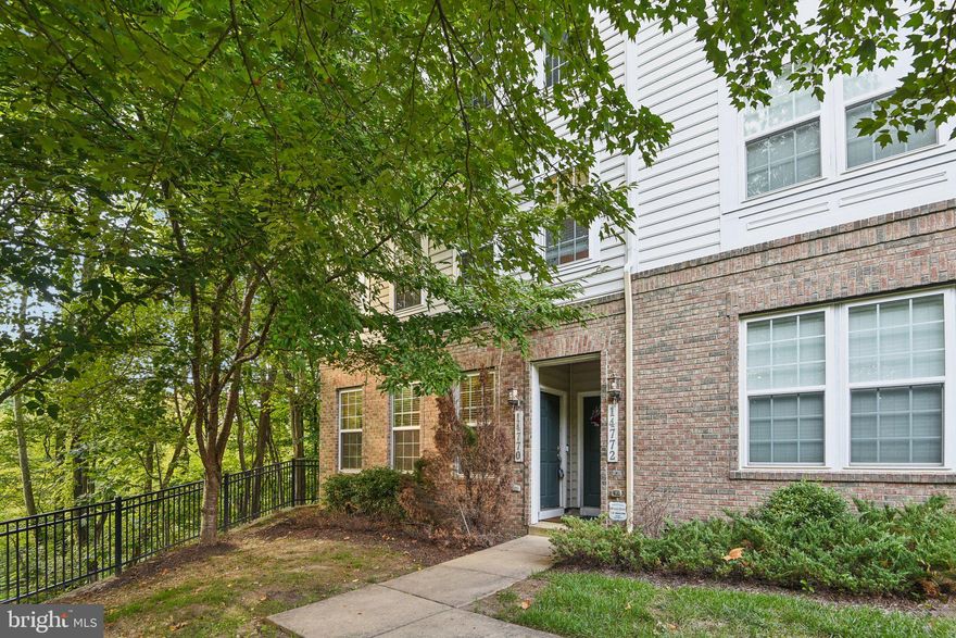 This charming brick-front, end-unit townhome-style condo is elegantly situated along a scenic, tree-lined entrance, highlighting its unique character. Inside, you'll discover a harmonious blend of beautiful hardwood floors, plush carpeting, and sophisticated finishes that enhance the home’s refined appeal.

The modern open-concept main level features warm wood flooring and sleek recessed lighting. The standout kitchen offers granite countertops, stainless steel appliances, and an island that provides both informal seating and extra storage. This culinary space seamlessly transitions into a bright dinette area and a spacious living room, bathed in natural light from numerous windows.

The primary bedroom serves as a private retreat with a full bathroom, two walk-in closets, and a contemporary ceiling fan. The en-suite bathroom is designed for comfort, featuring an extended vanity for additional storage and an oversized shower. All bathrooms have been updated with stylish flooring, modern hardware, and contemporary lighting.

In addition to the generously sized second bedroom, the home includes a versatile bonus space that can be adapted for use as a home office, rec room, or any other purpose that suits your needs. This bonus area opens onto a cozy deck through sliding glass doors, ideal for relaxation or entertaining.

In addition, a laundry area is conveniently located on the 2nd level.

Offering a blend of comfort and convenience, this home is ideally located with easy access to I-95, Route 1, VRE, and commuter lots. It is also close to Potomac Town Center, Potomac Mills Mall, and Wegmans.
