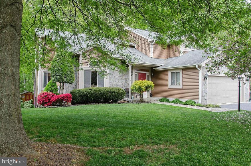 NEW ROOF! Don't overlook this one! Toomuchtolist, must see! 1 HALF ACRE of wonderful! Large stamped concrete patio w/ fire pit, huge deck with hot tub. New paint & tons more space inside. Dining rm flows through large open kitchen, table space & fam rm w/ gas FP. Updated Master Ba w/ sep tub 2 vanities. 4Bd, 2.5Ba 2car Gar! Stonework galore/Stamped driveway! Space for all of your toys & theirs!