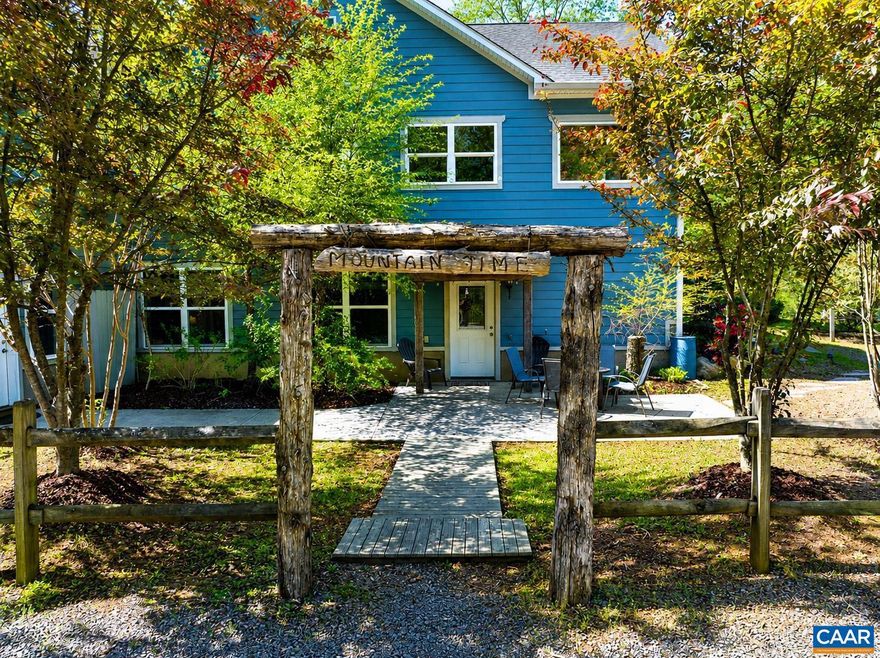 Set on over 20 private acres just minutes from Charlottesville and Wegmans, this exceptional property offers breathtaking mountain views and a rare combination of craftsmanship, comfort, and convenience. The main residence, built in 2015, features over 3,000 finished sf with 3 bedrooms and 2� baths. This stunning white oak timber frame home was thoughtfully designed and custom-built with beams hand-selected by the owner, who brings over 45 years of experience in the timber industry. The home offers true one-level living with an open floor plan, soaring ceilings, abundant natural light, and beautiful oak flooring throughout. A striking cherry bar and custom gas fireplace mantel?crafted from a tree sourced directly from the property?create a warm and inviting focal point. The spacious kitchen features quality cabinetry by Cabinets by Design. Outdoor living is equally impressive, with expansive deck space overlooking nearly level land, a koi pond, a spring-fed duck pond, and a firepit?all framed by sweeping mountain views. Additional improvements include a barn (approximately 52? x 16?), an outbuilding with a separate electric meter, and a charming guest house w/full bath, loft and private deck.  Convenient access to Rt 29 and I-64,Granite Counter,Fireplace in Living Room