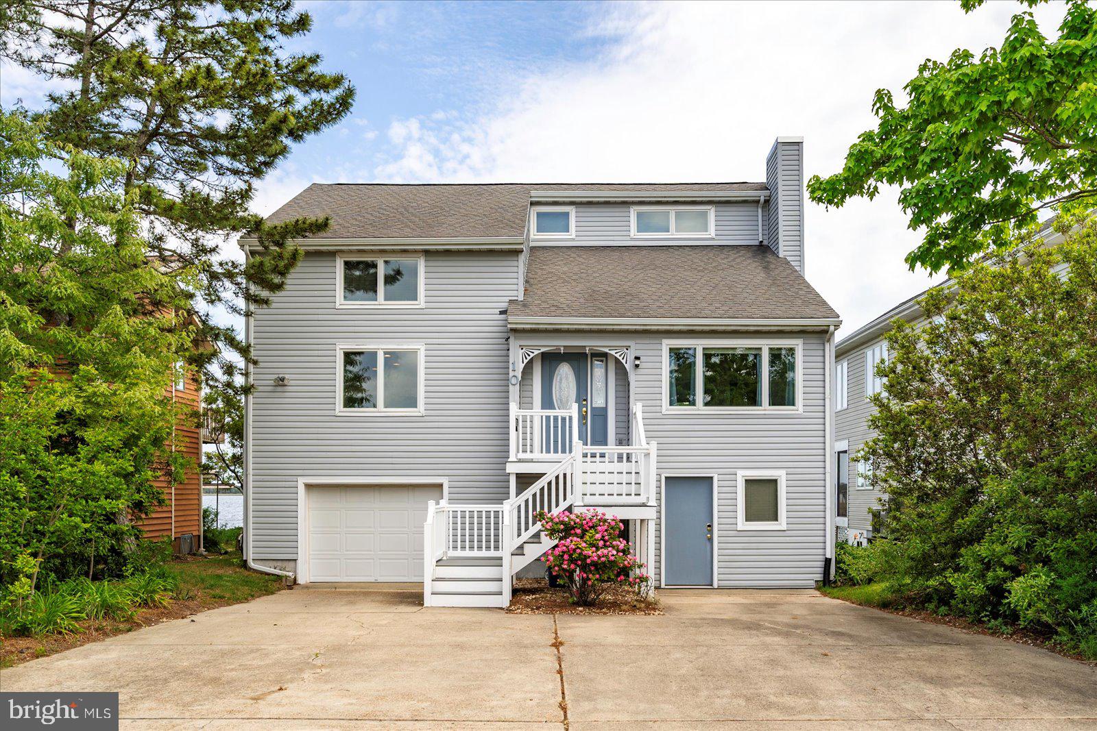 Live the coastal lifestyle in this beautifully updated waterfront home in sought-after Ocean Pines! This spacious 4-bedroom, 4-bath property offers direct water access with a private dock and new boat lift—perfect for easy trips to Ocean City and crabbing right off your deck.
Enjoy breathtaking waterfront, sunrise views every morning from your expansive maintenance free deck. Inside, you'll find a modern kitchen with granite countertops, wood cabinetry, stainless steel appliances, and fresh paint. This large 4BR home has tons of room for everyone with lots of natural light and views of the St. Martin River from most of the windows. The home is being sold furnished and features a newer HVAC, updated flooring throughout, renovated bathrooms, and other recent improvements including new upstairs windows and patio door. Another bonus is the full "basement" for additional storage/room etc.
Nestled in the desirable community of Ocean Pines, you'll have access to indoor/outdoor pools, a marina, yacht club, playgrounds, parks, sports courts, and more.
Don't miss this unique opportunity to own a move-in-ready waterfront retreat!
