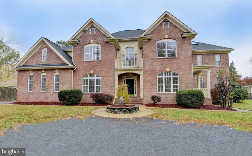 Awesome 5,000+ sq ft Colonial w/ 2 Car Garage! Just mins to Metro , 495, Old Town, Airport! Dramatic 2 story foyer & curved staircase. Kitchen w/ island, granite, SS appliances; opens to breakfast room & expansive living areas. Huge primary suite w/ sitting room, built-ins, jetted tub, tons of closet space. Back staircase to separate br/ba suite. Freshly painted, new carpets. Nice hardwoods, marble floors. Finished LL w/ walkout stairs, wet bar, rec room, full BA. Several patios & covered terraces. Bonus shed/workshop. Super convenient to West Potomac HS!