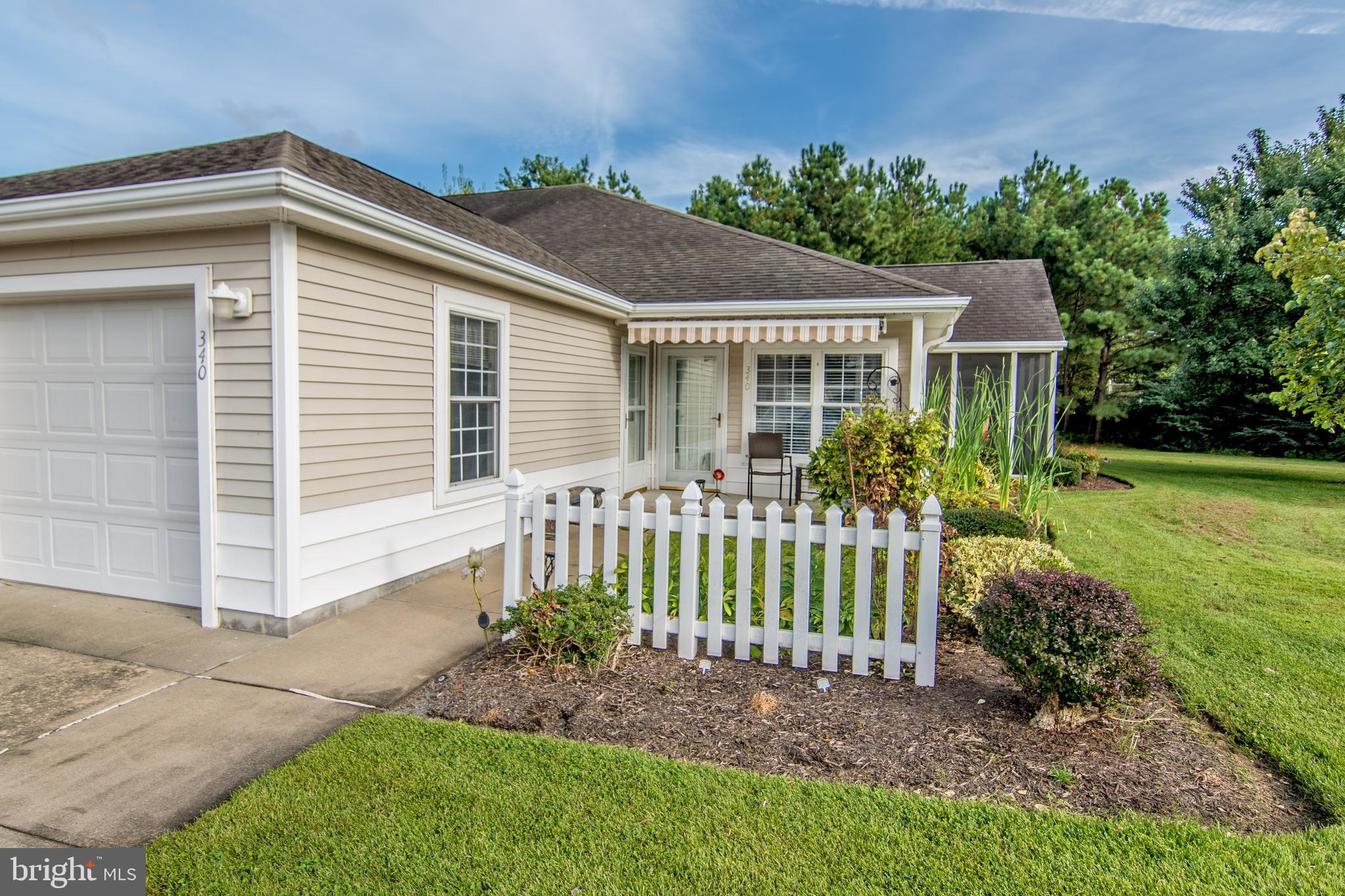 *Back on the market, due to no fault of the seller. Ready to enjoy maintenance-free living? This is one of the desirable condos in Avalon Retirement Community with 2 bedrooms, 2 baths, 1 car garage, and screened porch. It has 1103 sqft and is just waiting for you! The living room and dining area are combined. The kitchen has recessed lighting and wainscoting under the breakfast bar. The primary bedroom has primary bath with walk-in shower and separate vanity. There is also a full hall bath near the second bedroom. Enjoy the patio by the front door with black screens on the windows to reduce the heat. Also in the screened porch are blinds that you can roll down to avoid the late afternoon sun in the western sky. Decorative awning by the front door and fenced area where you can use your flowering or gardening talents. Updates include newer refrigerator, dishwasher and HVAC system. Buyer insures the inside and Condo Association fees include lawn maintenance, snow removal, power washing every other year, maintenance of the outside of the condo (including roof) and insurance of the building. All of this for $212/monthly! City water, sewer and trash to be paid quarterly. Close to shopping, restaurants, medical care, two universities and a 40 minute drive to MD beaches. With the lower condo fees, this will not last long. Being sold "As Is." Call today for your personal tour in this 55+ retirement community.