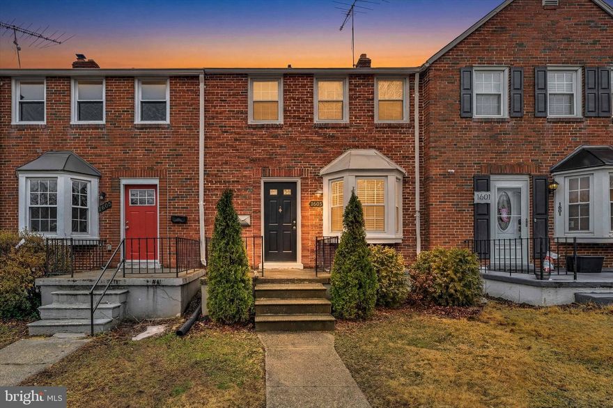 Welcome to 1603 Thetford Road — a beautifully renovated brick townhome tucked in the sought-after Knettishall community of Towson. From the moment you arrive, the classic curb appeal and charming bay window set the tone for what awaits inside.
Step through the front door into a sunlit living room featuring refinished original hardwood floors, recessed lighting, and an inviting layout that flows effortlessly into the dining area. The kitchen is a showstopper — rich dark cabinetry, granite counters, stainless steel appliances including a gas range, a tile backsplash with mosaic accents, and a spacious peninsula island perfect for entertaining. Whether it's a dinner party or a quiet weeknight meal, this kitchen delivers.
Upstairs you'll find three generous bedrooms with hardwood floors and ceiling fans throughout, plus a fully renovated full bath. The primary bedroom offers dual closets and abundant natural light.
Downstairs, you'll find a blank canvas of possibility — fully finished with tile, recessed lighting, egress windows, a second full bath, and laundry — ideal as a family room, home office, or media space. A rear walkout leads to a fenced yard with a private parking pad. All of this just minutes from Towson Town Center, I-695, and top-rated dining and shopping.