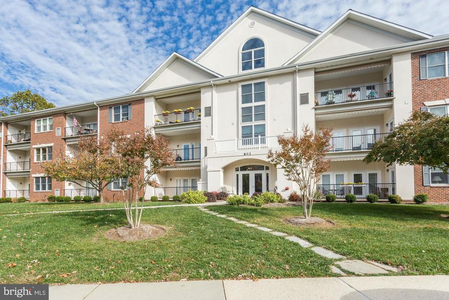 Sharp 2nd floor condo in close proximity to elevator. Gleaming hardwood, updated kitchen w/granite counters & added built-ins, updated bathroom & newly carpeted bedrooms. Garage parking space/storage unit convey w/sale. Heritage Harbour offers a long list of amenities for active seniors. Partake in a wonderful lifestyle near shopping & downtown Annapolis w/all its offerings.