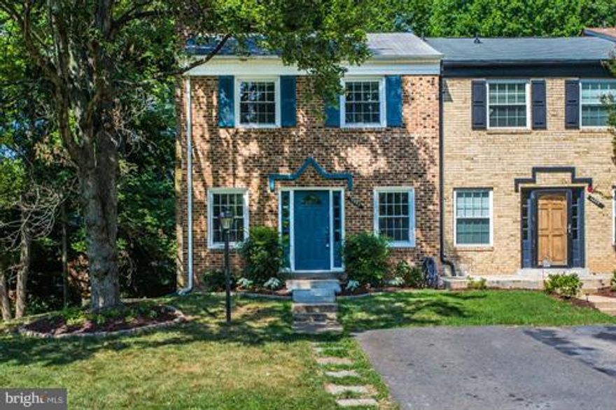 Stunning Updtd End Unit ALL brick townhome backing to Parkland!Gorgeous Hrd wds flrs greet you on main lvl! Sunny & bright Liv/Dining room combo. Gourmet Kit w/Granite counter tops and island! Upper lvl boast 3 generous sized BR's w/ ample closet space! Updated FB wi/ custom tile! Lower level recreation room with wood burning fireplace w/sliding glass door to trex deck & over-sized fenced yard!