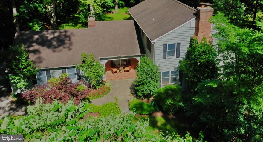 Price Improved -   Welcome to 11547 Saint Davids Lane – Fantastic Opportunity in the Falls Rd Corridor, located on a private lane, but just minutes to 695 and I83 and Greenspring Station with restaurants, boutiques, and a new Johns Hopkins healthcare facility.  This 5 bedroom, 3 ½ bath home has been thoughtfully updated and meticulously maintained.  The main floor was generously expanded in 2019 to create a new breakfast room, family room, laundry/mud room and a luxurious owners’ suite. Nicely nestled on a level lot, with mature landscaping, a stone walkway leads you to the covered front porch. The gracious living room is surrounded by windows, and features a wood burning fireplace with mantel, and recessed lighting.  A separate formal dining room with crown molding and chair rail is accessible from the living room, foyer and kitchen, offering easy flow throughout.  You’ll enjoy cooking in the modern kitchen which features granite counter tops, 42” hand-made maple cabinets, triple pantry, and stainless steel appliances.  A large island in the center of the kitchen offers a 5-burner gas cooktop, a curved sink, a wine rack and a breakfast bar.  Sleek pendant fixtures highlight the island. The breakfast room features a tray ceiling and custom built-ins and is open to the family room. A French door leads to the deck, which was added during the 2019 expansion. A handsome den is located off the family room and is also accessible from the foyer.  The den boasts a wood burning fireplace, and generous custom built-ins. Pocket doors to the family room provide privacy, ideal for working from home.  The large primary suite located in the rear of the first floor boasts vaulted ceilings, two large closets, and ensuite bath, with quartz counters, dual sinks, and large walk-in shower. Both the first and second levels feature hardwood floors throughout. The bright laundry room offers plenty of storage and is accessible from the mudroom and provides a second entrance to the rear deck. The original owners’ suite on the second floor features a private bath, and three additional bedrooms share a hall bath. There is a spacious rec-room in the lower level, with covered walk-up stairs to the side yard. The attached three-car garage with optional EV charger is accessible through the mudroom as well as through the covered front porch. A complete list of updates is available online in the seller disclosure package . Below market owner financing available