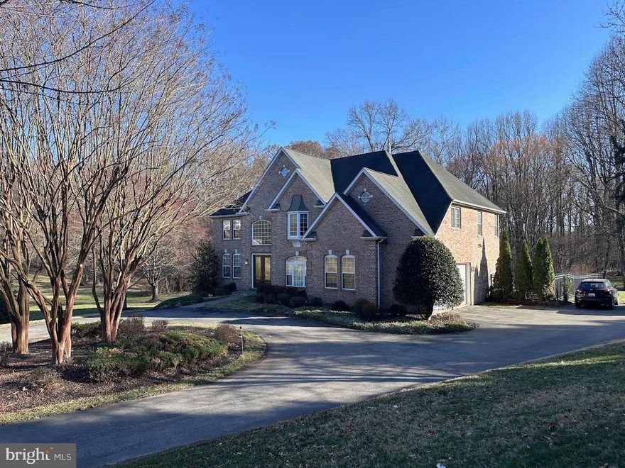 Nestled on 3.89 private acres, this stunning estate offers the perfect blend of luxury, space, and seclusion. A long driveway lined with picturesque Cherry Blossom trees welcomes you home, setting the stage for this one-of-a-kind retreat. The inground pool, surrounded by an expansive concrete patio and wrought iron fencing, creates a serene backyard oasis, perfect for lounging, grilling, and entertaining—with no neighbors behind to disturb the peace.

Step inside to a breathtaking two-story family room filled with natural light, offering gorgeous views of the pool and lush tree-lined backdrop. The spacious gourmet kitchen seamlessly connects to the living space, making it ideal for both daily living and hosting gatherings. The main level features a private office, formal dining room, and living room, all accented by hardwood floors and a grand tile entryway.

The owner’s suite is a true sanctuary, boasting vaulted ceilings and an updated spa-like bathroom. With 5 bedrooms and 3.5 baths, this home provides ample space, including a fully finished basement with a 5th bedroom, full bath, generous living area, and a versatile bonus room—perfect for a home theater, study, or man cave.

Tucked far off the main road with well and septic systems, this property offers an unparalleled sense of privacy while still being conveniently located. A rare find—don’t miss the chance to make this exquisite home yours!