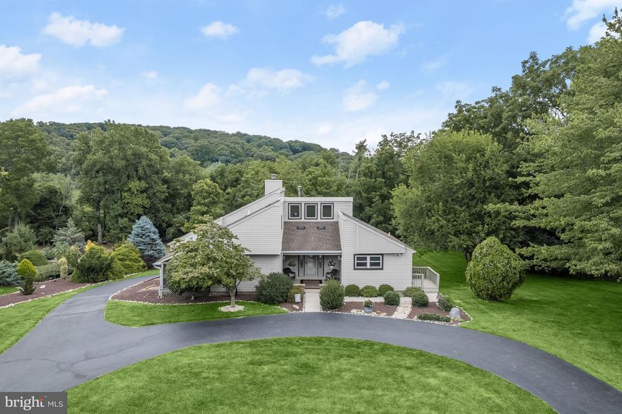 Welcome to 5707 Woodlyn Road, Frederick MD! This stunning property offers a serene and picturesque setting on approximately 0.94 acres of land. As you approach the home, you’ll be captivated by the incredible views and landscaped grounds. The living room is a cozy retreat, featuring a wood stove, soaring cathedral weed ceilings, a wet bar, and an additional sitting area perfect for a home office or reading nook. From the living room, you can access the expansive deck taking in the exceptional surrounding scenic views. The kitchen and dining rooms showcase exposed beams, adding character and charm to the space. The kitchen is well equipped with ample cabinetry and offers a delightful space for preparing meals and entertaining guests. Three bedrooms one of which has direct access to the screened in porch and a full bath complete the main level. As you ascend to the upper level, you will find the primary bedroom, a peaceful sanctuary with vaulted wood ceilings and accent wall that creates a sense of openness. The primary bedroom also includes an en-suite full bath for added convenience. Additionally, there’s a loft area, providing a versatile space that can be used as a home office or sitting area. The lower level is finished, offering extra living space that can be used as a recreation room, media room, or exercise area, providing plenty of room for various activities and hobbies,  also included is a laundry room, and powder room. The exterior features a wrap around driveway, a two car attached garage at the rear of the house, ensuring ease of parking, side deck, upper deck, patio, and a screened porch. This property truly offers a unique and desirable living experience with its spacious lot, stunning views, and charming interior. Welcome home!