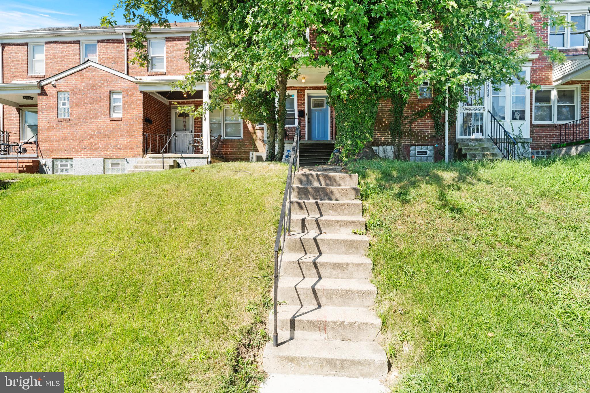 Welcome home to 3834 Greenspring Ave! Maintained with love and cleanliness, this traditional style brick interior row home invites any potential homeowner searching to plant roots in the historic Greenspring community with its charm and modernization. With three second floor bedrooms and one full bathroom, this home features a spacious main floor living room and dining room with hard wood flooring throughout, a half bathroom, a chef’s kitchen with granite counter tops, ceramic tile flooring, and-stainless steel appliances. Descend down the kitchen’s interior steps to a finished basement perfect for entertainment, including an additional half bathroom and a separate utility room with washer and dryer. From the kitchen or from the basement, exit to the homes fenced in backyard with bonus alley parking. Located near major bus routes, I-83, and minutes from Druid Hill Park, the Baltimore Zoo, and Baltimore City Community College; 3834 Greenspring Ave is ready for your looking pleasure!