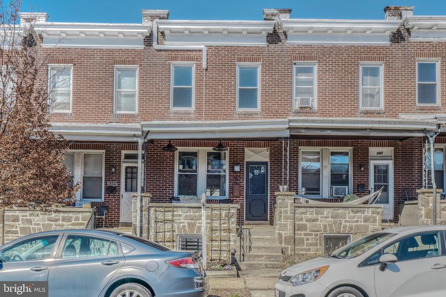 New listing Remington.  Call your agent and make an appointment today! Turn-key row home located in the vibrant and hip Remington Community in North Baltimore City.  This location can't be beat!  It is situated on quiet 30th St.  just one block to R House, one block to Wyman Park, and a short walk to JHU Homewood Campus, next door to JUH Security Station and Balto City Police Station.  Remington has a Walkability Score of 91 and a Bike Score of 87. Located just 2 minutes to I83, 30 minutes to BWI and 5 minutes to Penn Station makes it a great spot for those who need easy access to transportation.  Parking is never an issue on this quiet street. This home will have you at hello with its welcoming front porch with charming wood beadboard ceiling and ceiling fans (2021). The exterior is brick and stone construction.  The home is updated with replacement windows, 5 mini-split HVAC Heat & AC units in 2020, (there is also radiator/steam heat), hot water heater in 2019, stainless refrigerator in 2021.  The home features beautiful hardwood floors on the main level and on the staircase to the upper. The main level has an open floor-plan with a living room, dining room and kitchen. There is a closet in the dining room. The upper level is carpeted and features three bedrooms- each with its own mini-split AC/Heat, closet, and windows. The closet system in the middle bedroom is included in the sale and provides loads of storage space. The full bath on the upper has a shower/tub, a cubby storage area and a window! The lower level features a large living space with a mini-split AC/Heat and luxury vinyl plank flooring (2019) throughout. There is a full bath with a shower & tub and storage area. There is a large closet under the stairs and an unfinished laundry/ utility room which has an exit to the walk-out staircase to the backyard. The extra fridge in the laundry room is included.  The backyard is fenced and features a metal porch with an awning, a concrete patio with a pergola, a grassy area, and a planting bed. There is a garden in the front as well! There is Cat6 ethernet wiring which makes for a steady Wi-Fi connection- great for working/school from home. This home offers city living at its finest!