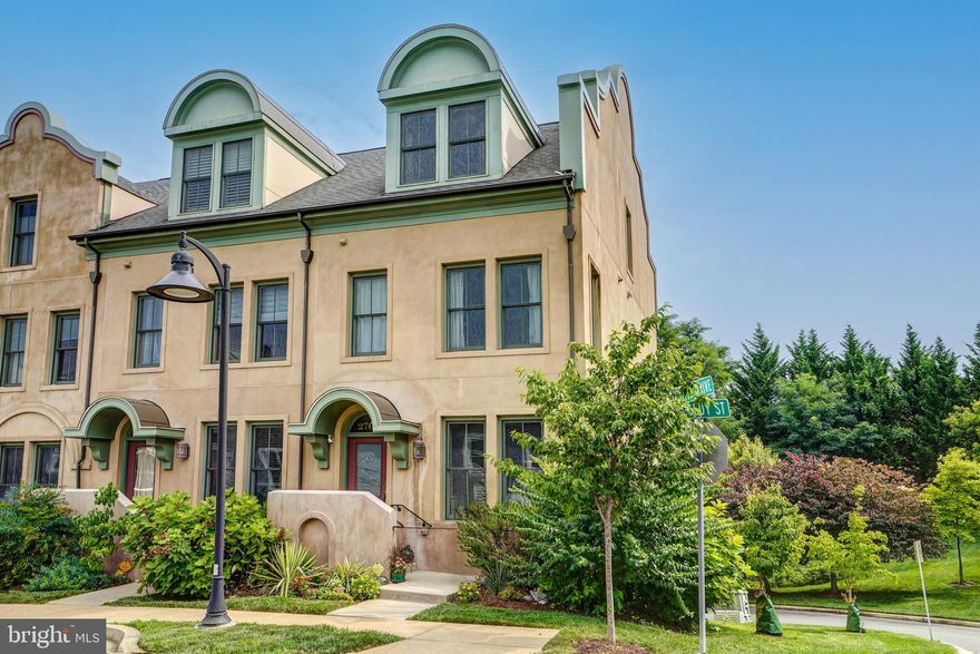 Welcome to this spacious four level, end unit townhome nestled in the sought after historic National Park Seminary community.  This unique Spanish Mission style exterior townhome features 3 bedrooms, 3.5 bathrooms, 2000+ square feet, a roof top deck, two fireplaces and stunning views of the glen.  This home has an easy access street level entrance with a covered overhang which flows into the bright and airy open floor plan living area.  The main level features three walls of windows allowing abundant sunlight, beautiful hardwood 
floors, tall ceilings and a powder room.  The kitchen includes a large granite island, granite counter tops, gas stove/range, beautiful shaker cabinets, built-in desk and a balcony perfect for morning coffee.  Upstairs the luxurious master suite includes an extended sitting area, a large walk-in closet and a master bath.  The master bath includes a double vanity with travertine countertops, custom frameless shower, soaking tub, linen closet, and pretty tiles throughout. The second level also includes an en suite bedroom/bathroom and a convenient laundry room.  The top level features vaulted ceilings, a third en suite bedroom/bathroom and a separate bonus space with a full wet bar, mini refrigerator and indoor/outdoor fireplace.  The roof top deck is the perfect place to entertain friends or enjoy a quiet evening in front of the fireplace while taking in the best scenic views in the neighborhood.  The lower level of the home features a two car garage and a den with the second fireplace which is perfect for a home office, playroom, exercise room or man/woman cave.  HOA fees include exercise room and community room access, landscaping, and snow removal.  National Park Seminary is a historic neighborhood surrounded by walking trails, whimsical historic architecture, statuary and features a fully restored ballroom.  This peaceful oasis has its own access to Rock Creek Park/Beach Drive and is minutes from downtown Silver Spring, Forest Glen Metro and 495.

Offers due by Wednesday at 5pm