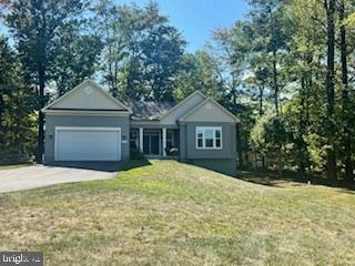 Come check out this amazing rancher home! The basement has been framed and includes a 3-part
rough-in and walk-out! Situated on a spacious 1.10-acre lot in a lovely cul-de-sac, this home also
features a partially wooded area for added charm. A lovely portion of the forested land is a protected
conservation area. The interior boasts beautiful upgrade maple engineered wood floors, upgraded carpet,
and a stunning cathedral ceiling with recessed lights that also extends into the owner suite. With a little
bit of TLC, this home can be transformed into your dream oasis. Don't miss out on the opportunity to
make this house your own!