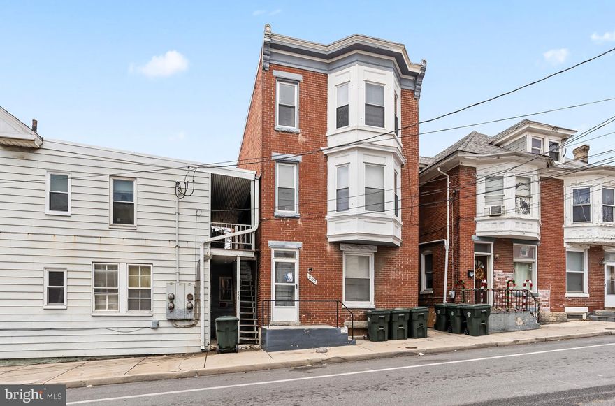 ***Investor Alert*** 3 Unit Brick Apartment Building with each Unit Offering 2 Bedrooms. Units 1 and 3 are Fully Updated with Unit 2 being Partially Updated. Each Unit is Separately Metered with its own Water Heater. Replacement Windows Throughout.