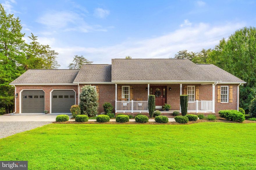 Absolutely stunning all-brick rambler on 3 acres in beautiful Madison county.  You’ll be amazed by the custom upgrades, attention to detail, and level of craftmanship throughout the home.  The entrance to the home opens up to the formal living room on the left, and the family room straight ahead, with gas fireplace and stone surround. The kitchen was fully renovated, and includes beautiful tile, stone, & brickwork, and some new appliances.  Between the kitchen and formal dining room, there is a large walk-in pantry.  The owner's suite features a walk-in closet, and en suite bathroom with luxury tile shower & flooring, and additional brickwork.  The second bedroom and hall bathroom are also on this main level.  The flooring on this level consists of all hardwood and new custom tile.   Newly finished this year, the walk-out basement is full of light, and includes the large 3rd bedroom, luxury bathroom, kitchenette, rec room w/ bar, an office space, an additional bonus room (not pictured), and a storage room with built-in shelving.  Enjoy outdoor living on the covered front porch, large back deck, or lower patio.  The two-car attached garage offers a utility sink and built-in cabinets & workbench.  Other updates in recent years include new heat pump (with gas backup) in 2017, all new interior paint, garage paint, new exterior shutters,  professional landscaping, concrete walkway & patio, custom lighting throughout the home,  raised garden bed, & extended driveway for more parking.  You will love to call this amazing property home!