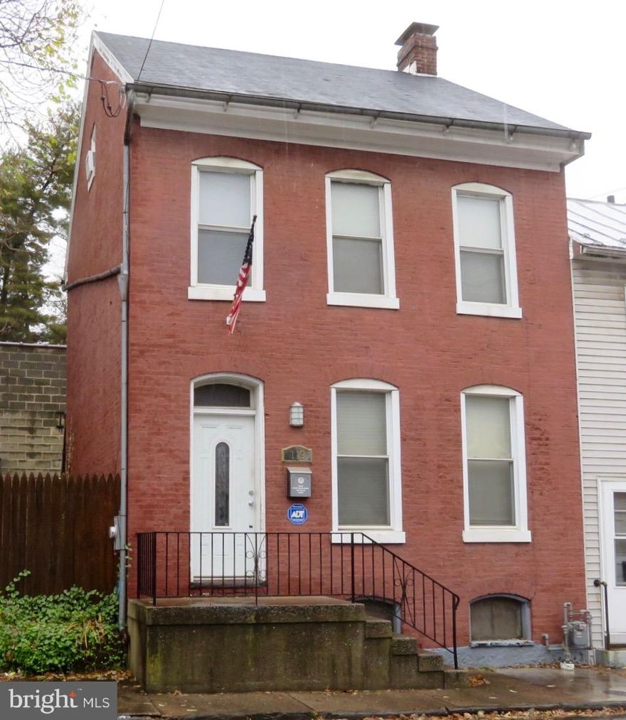 Renovated  brick row house, end unit.  Designer features throughout. Open floor plan, large master suite, 2nd floor laundry,  finished attic, privacy fence.  Downtown location - short walk to University of Maryland campus, Arts and Education District, City Park, Maryland Theater and restaurants.