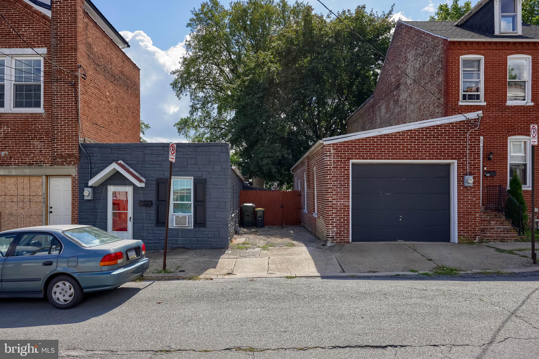 Welcome to 746 -748 W. Vine Street!! This one-of-a-kind home offers first-floor living and has an oversized 1-car garage with heat, electric, and water run to it, additional off-street parking, and a large fenced-in back yard. With over 1,000 square feet of living space, this home features 2 bedrooms and a full bath! As you step inside the front door, you're welcomed into the living room and dining area, and the kitchen offers a gas range and stainless steel appliances. The full bathroom also includes the laundry area, and then there are two bedrooms. The outdoor area has a covered patio, making it the perfect area to sit out and enjoy the outdoors! Make sure to schedule your showing today before it's too late!