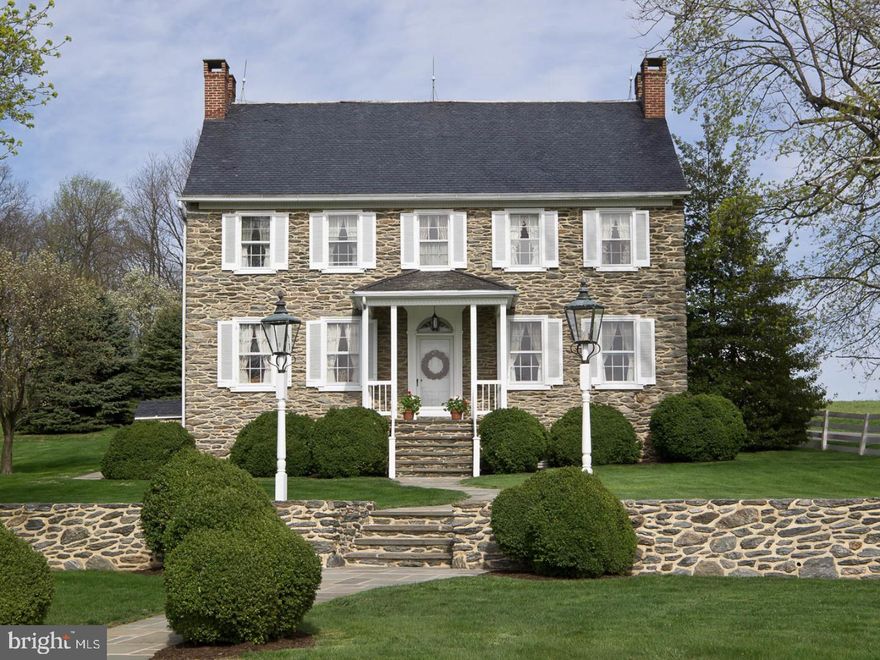 This country estate showcases an 1841 stone farmhouse that has been authentically restored to it's 19th century grandeur. The owner has meticulously detailed the home to reveal the original craftsmanship of the stone walls, hardwood floors, solid wooden doors, hardware & the four working fireplaces. Several outbuildings include a collectors dream 3 story 40x40 heated & air conditioned barn. Schedule your private showing.