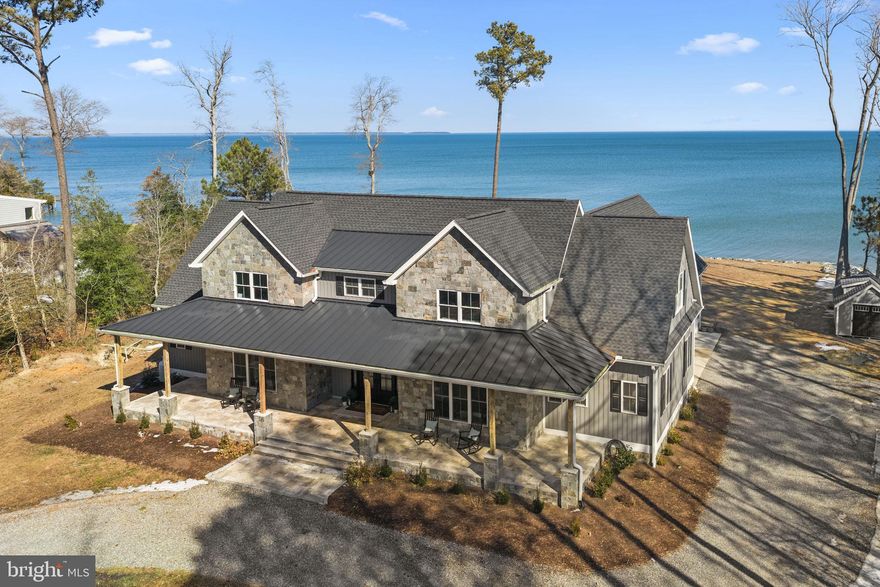 Welcome to 3300 Mob Neck Road on the gorgeous Potomac River! Fishing, Boating, Days on your Private Beach, relaxation at its finest! This custom 4700 square foot home was built in 2022. Enter the gorgeous stone pillars flanking the driveway and the views begin! Circular driveway to the massive 8x8 Wrought Iron double front doors with Rain glass on the interior. Large & Open Living Kitchen with Quartz counter tops and dining room. Butlers pantry, large pantry, office and first floor laundry leads to 3 bay side entrance garage. First floor primary bedroom and luxurious primary bath with leathered marble countertops, his and hers walk-in closets/rooms! Luxury shower system in primary bath. Tile flooring throughout. 3 bedrooms with additional office along with 2 additional bonus rooms, game room, second floor living space, Second floor laundry, 4 full baths total! Private Beach!!! Community Water system , conventional septic, invisible fence installed along with multiple doggie doors! Tankless water heater. Spend relaxing days and nights at the beach or in front of the outdoor fireplace!