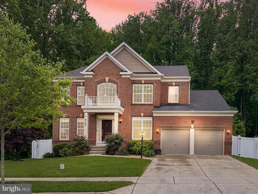 In-Law Bedroom and FULL BATH on MAIN LEVEL! This stunning house is SO MUCH bigger than it looks from the outside. With a total building size of 6,221 sq ft, this 6-bedroom (YES, SIX LEGAL BEDROOMS) brick-front modern colonial home in Parkside at Westphalia is perfect for multigenerational living, featuring an in-law suite on the main level. The impressive 2-story foyer leads to a luxurious office and living room, followed by a formal dining room and an open-concept kitchen and family room. The kitchen boasts 42" soft-close cabinetry, a double wall oven, upgraded Giallo granite countertops, and a 5-burner gas cooktop, opening to a meticulously maintained backyard. Upstairs, all bedrooms include walk-in closets, and the primary bedroom features a custom California Closet and a gorgeous spa-like bathroom. The walk-out basement offers extensive open space, a full bathroom, a very nice full-size bar, a gym, a yoga room, and a 6th legal bedroom. Additional features include crown molding, recessed lighting, oak stairs with wrought iron balusters, Gutter Guards, an oversized 2-car garage, and a HUGE, USABLE fully fenced backyard with a professionally hardscaped custom patio! Included in HOA fee: Enjoy resort-style amenities at The Club at Parkside, including a clubhouse, gym, sports lounge, game rooms, playground, trails, and 2 pools. Conveniently located near I-495, Joint Base Andrews, and DC.
