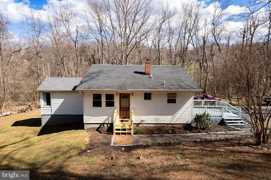 EXCELLENT STARTER HOME OR PRIVATE RETREAT!!! WON'T LAST LONG!!! 4 Bedroom home nestled on over 3.25 acres of privacy!!! Newer LVP flooring, Cabinets, granite countertops, tile, Fence rear, Dishwasher, Tilt in Vinyl Windows, Shelving, Hot Water Heater, Toilets and Vanities, Front Stoop, Roof & Gutters 11 years old, Door knobs exterior and much more!! Located in the highly sought after neighborhood of Lake Front Royal at the base of the mountains. This house has been well maintained and improved. Fresh painting outside and inside. Access to Appalachian Trail from community.  Small Pond and Creek on the property and the neighborhood has a lake.  If you're looking to get away from the hustle and bustle, and wouldn't mind some mountain views, you don't want to miss out on this one!!! COME SEE IT TODAY!!!