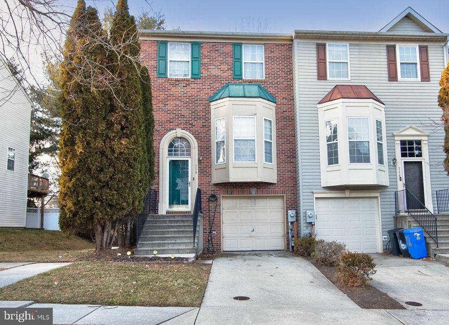 Located in the center of it all with easy access to 795 and the Baltimore beltway, this End-of-Group townhouse is ready for new owners.  The spacious 2-bedroom & loft, 2.5-full bathroom residence features a generously sized eat-in kitchen with breakfast nook to deck, an open-plan living and dining area, and a finished lower level, providing ample space for both entertaining and everyday living. The open floor plan of the first floor offers ample space for entertaining with gleaming hardwood floors throughout.  The owner's suite has vaulted ceilings with a large walk-in closet and en-suite with double sinks, walk in shower, and soaking tub. The finished lower level offers additional room for leisure activities or storage and offers a laundry closet. Unwind on your outdoor deck or enjoy a leisurely stroll around the neighborhood. Enjoy the convenience of a single-car garage and extra parking in the driveway. Don't let this exceptional opportunity slip away!