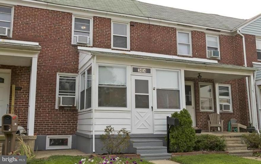 This delightful home will provide years of easy & carefree living.  Its many features include an enclosed front porch, covered rear porch, private parking, stylish kitchen, finished basement with fireplace & half bath, separate laundry room, 2 good sized upper level bedrooms, updated full bath, and gas heat & double pane windows.  Convenient to shopping, transportation & the Bay.