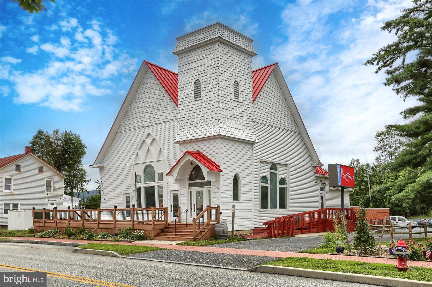 Versatile Mixed-Use Opportunity in the Heart of Linglestown – 4,756 SF Freestanding Building. Located in the highly visible and walkable Village of Linglestown, this mixed-use property presents a rare opportunity for an investor or owner-user. Positioned in a prominent area with excellent exposure, the property offers zoning ideal for a variety of uses, including a restaurant, event space, retail storefront, or place of worship. The interior has been freshly painted, providing a clean slate for your business vision. This cathedral style structure still has the original hardwood floors from 1905. All existing commercial kitchen equipment conveys with the sale, offering significant value for restaurant operators or food service entrepreneurs. There are 16 private parking spaces behind the building with 2 additional spaces on the street. Parking in the Township community lot to the north is allowed by Special Exception, thereby potentially increasing the number of parking spaces. The building is currently unoccupied, allowing for immediate occupancy or tenant customization. Do not miss your opportunity to own one of Linglestown's most iconic structures and capitalize on its rich history to make your venture a success!