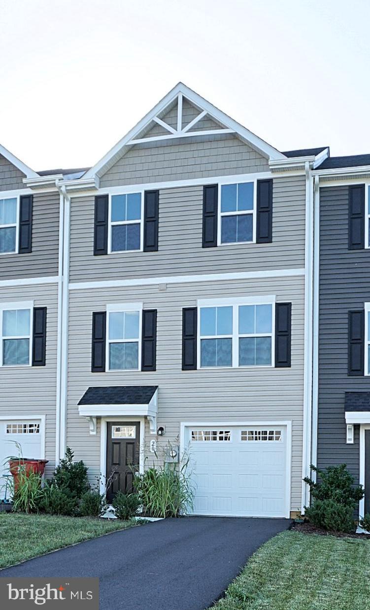 A lovely 3-story brand townhouse with one car garage will be ready for rent on August 1st. The main level is open and airy, with a large well-designed kitchen that's open to the living area, there is an island for more workspace. A dining area provides a great space for entertaining.
Upstairs there are three bedrooms, each with plenty of closet space, a laundry closet that can hold a full-size washer and dryer, and here is a generous size hall bath. The owner's suite features its own full bath and a huge walk-in closet. The lower/entry-level has a garage and a finished area which could be perfect for an office or a rec room. Entry-level is above ground and opens to a very private backyard. Great location, close to main roads and shopping. No smokers and pets are considered case by case with non refundable pet deposit . Minimum one-year lease.