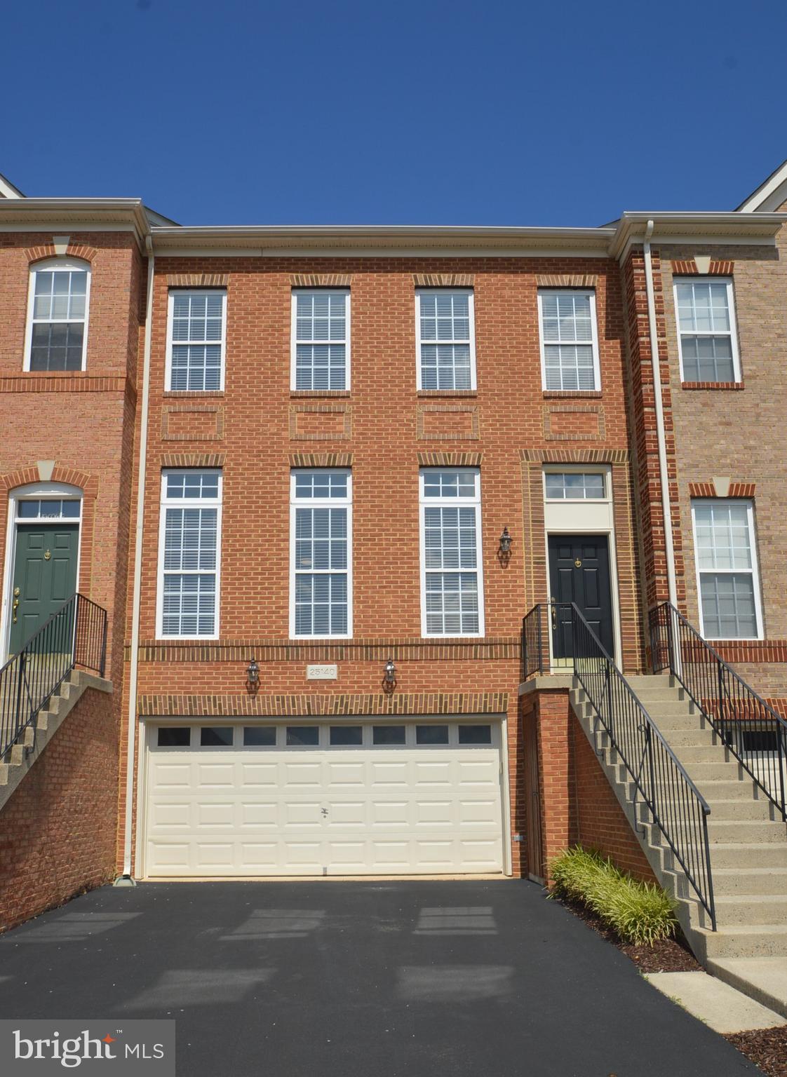 PLEASE REMOVE SHOES*NEED TWO HOUR NOTICE FOR CURRENT TENANT* NEWER HARDWOOD FLOORS IN LIVING ROOM & DINING ROOM, NEWER LOWER LEVEL WIDE PLANK LVP FLOORING & NEWER UPPER LEVEL WALL TO WALL CARPET*SHOWS IMMACULATE FROM TOP TO BOTTOM*OPEN, LIGHT & BRIGHT THROUGHOUT*BRICK FRONT VAN METRE "MOSBY" MODEL WITH OVER 2,500 FINISHED SQUARE FEET*3 BEDROOMS, 2 FULL, 2 HALF BATHS & OVERSIZED 2 CAR GARAGE*LOCATED ON PRIVATE STREET BACKING TO TREES*9 FOOT CEILINGS ON MAIN LEVEL*VOLUME CEILINGS IN KITCHEN & FAMILY ROOM*LARGE OPEN LIVING ROOM*STEP UP TO FORMAL DINING ROOM*GOURMET KITCHEN WITH CENTER ISLAND & GRANITE COUNTERTOPS*SEPARATE BREAKFAST AREA*MAIN LEVEL FAMILY ROOM*WALK OUT TO REAR DECK BACKING TO TREES*STEP UP TO PRIMARY BEDROOM WITH VAULTED CEILINGS & WALK IN CLOSET*LUXURY PRIMARY BATH WITH VAULTED CEILINGS, SEPARATE SHOWER & OVERSIZED 2 PERSON SOAKING TUB*2 ADDITIONAL BEDROOMS & FULL BATH ON UPPER LEVEL*FINISHED LOWER LEVEL REC ROOM WITH GAS FIREPLACE & HALF BATH*WALK OUT TO FENCED IN REAR YARD*EXTRA STORAGE & PARKING IN FRONT*ENJOY ALL OF STONE RIDGE AMENITIES TO INCLUDE SHOPPING, GROCERY, RETAIL & RESTAURANTS*