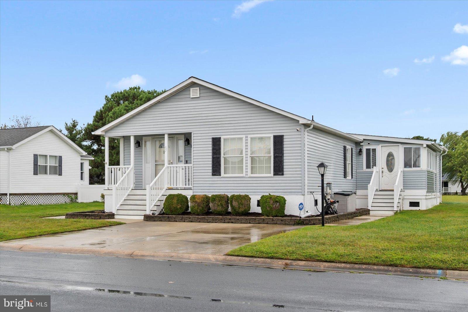 Nestled in the quiet West OC community of Mystic Harbour, this oversized coastal cottage offers 1,640 square feet of thoughtfully designed space. As you step inside, you are greeted by a living room, dining room, family room, sunroom and 4 bedrooms. The community offers an outdoor pool, playground, tennis and basketball courts. Conveniently located in West Ocean City close to the beach, shopping and Assateague. Don't miss your chance to make coastal retreat your own.