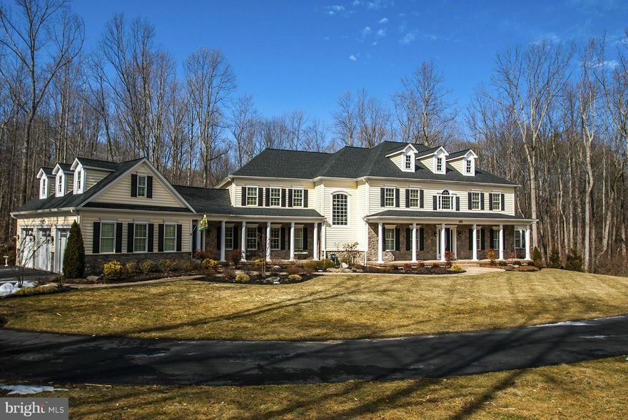 Spectacular home.Wonderful living and entertaining areas, gourmet kitchen/ spacious family room opens to screened porch w/gas FP overlooking incredible pool area with outdoor kitchen. Lower level opens to pool and features large fam rm, home theater, exercise rm and guest br. Sep.office/au-pair suite over the garage. Private lot with gorgeous landscaping. Very easy commute to DC,Balt and Annapolis